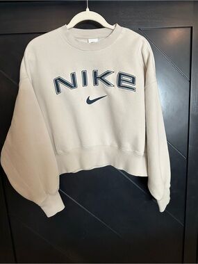 Nike Women's Cropped Crew Sweatshirt in Light Beige with Black Logo